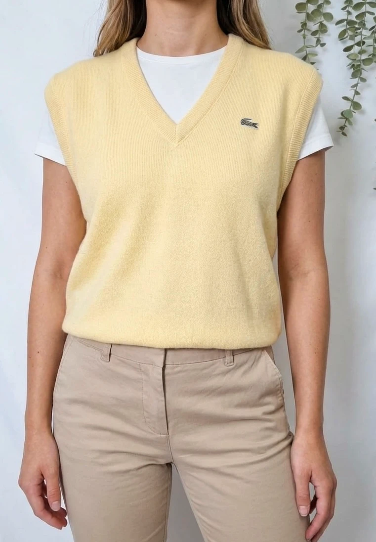 Pull sans manches vintage Lacoste jaune pastel en laine taille XL